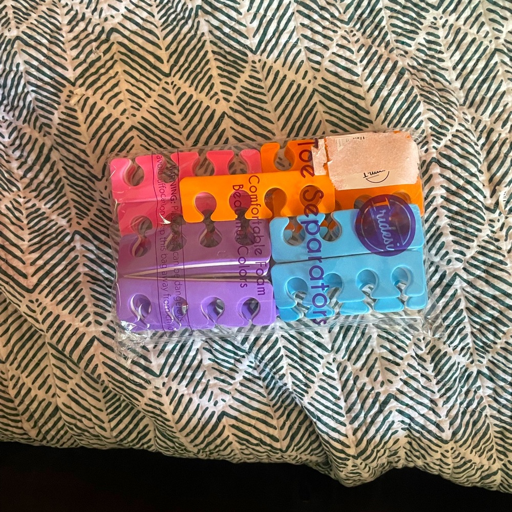 Multicolored toenail/finger separators for painting nails colors are neon colors